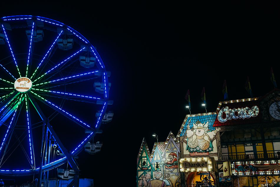 County fair carnival ferris wheel ride lit up at night