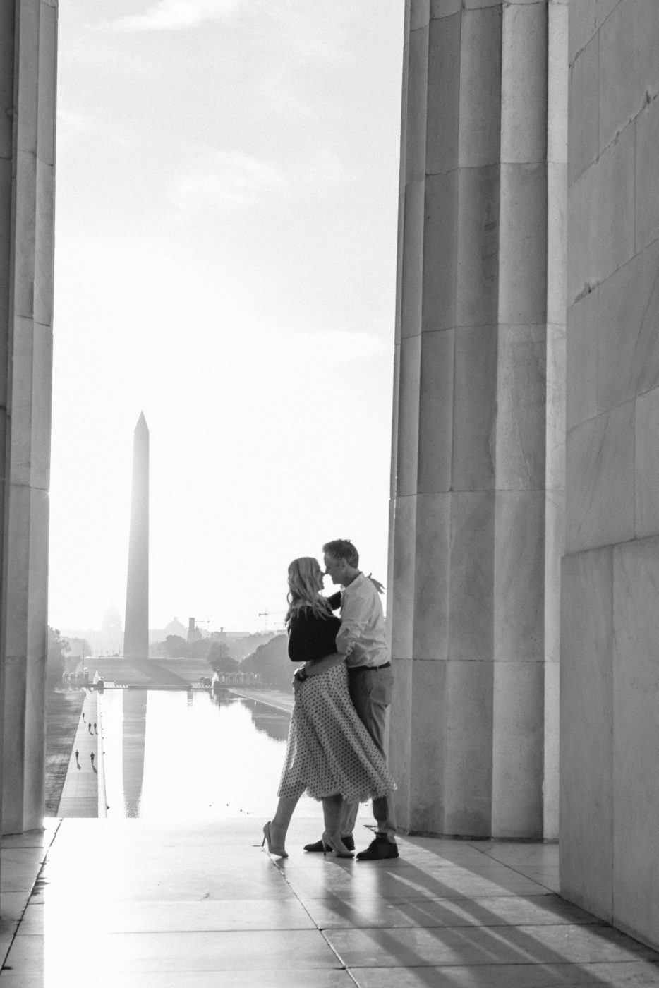 black and white photo of couple at the Lincoln Memorial