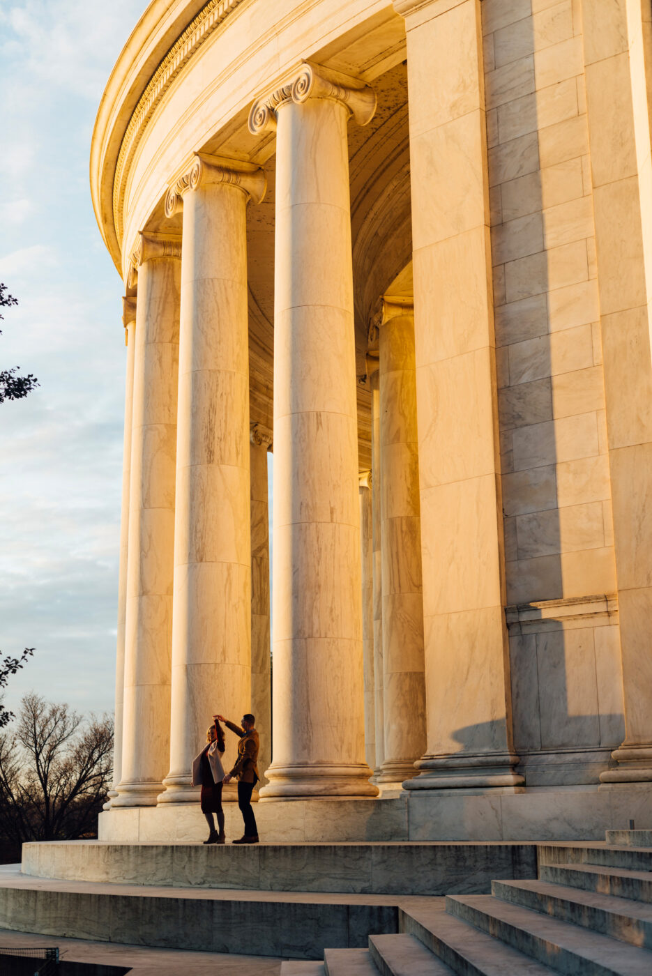 A couple dances on the steps of the Jefferson Memorial in Washington D.C.